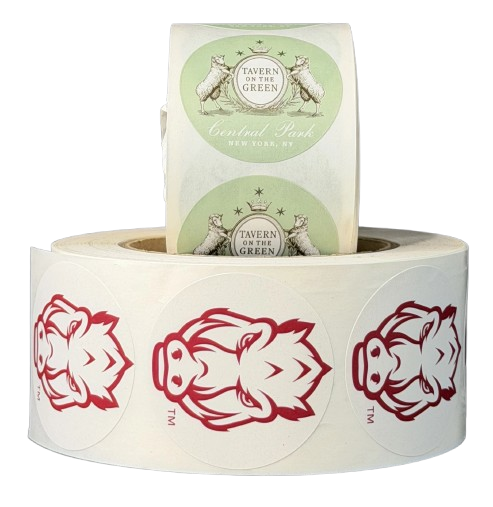 Scene with custom printed sticker rolls and packaging labels