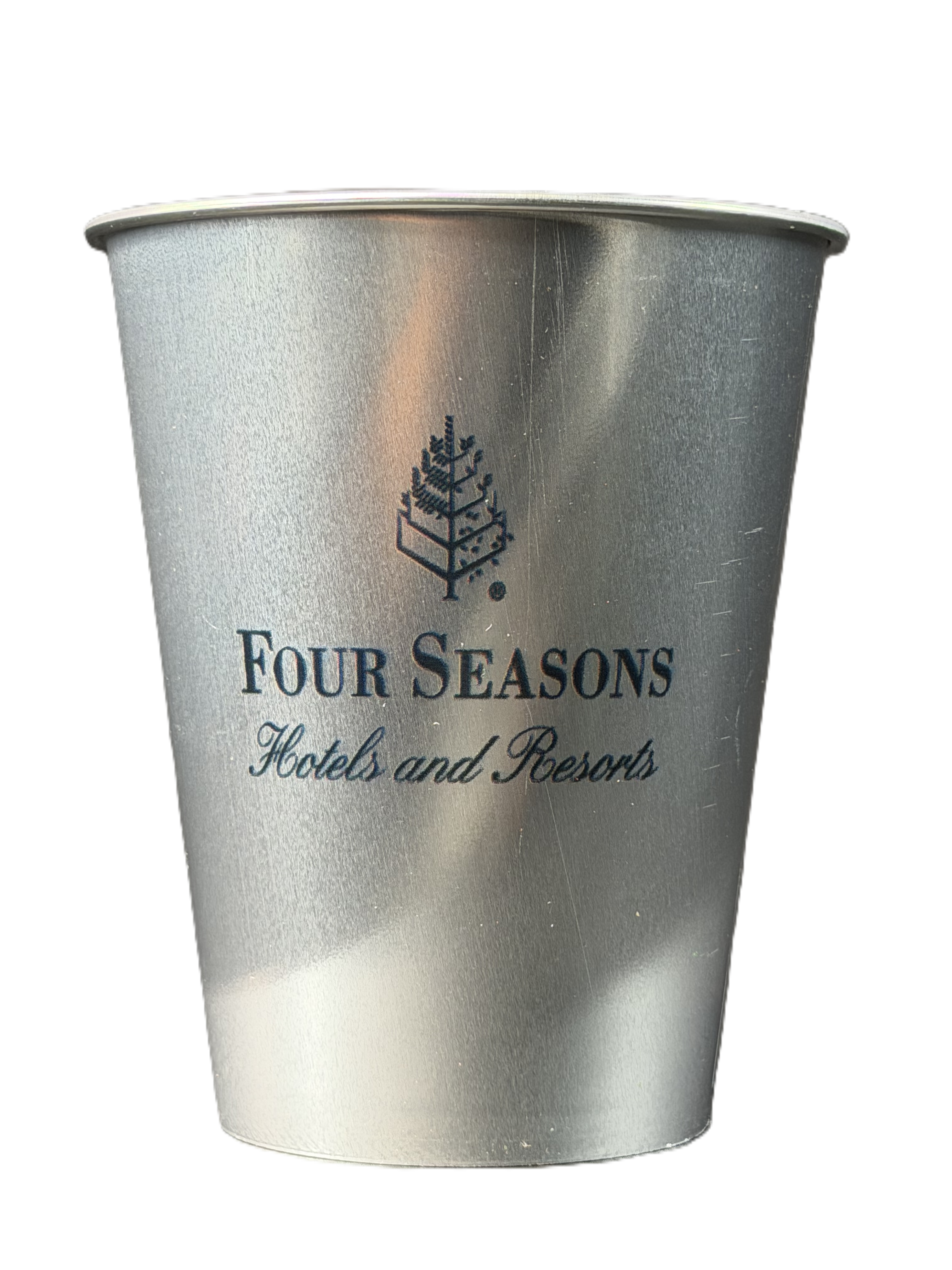 Silver single use aluminum cup printed with the Four Seasons Hotels and Resorts logo