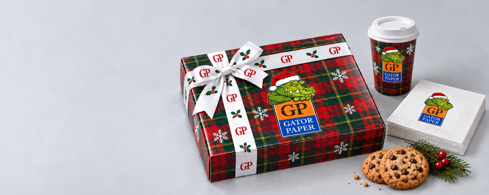 Gator Paper Christmas gift box, holiday cup, napkins, and branded packaging with the Gator Paper mascot